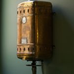 brown steel container on white wall