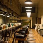 salon interior with lighted pendant lamps